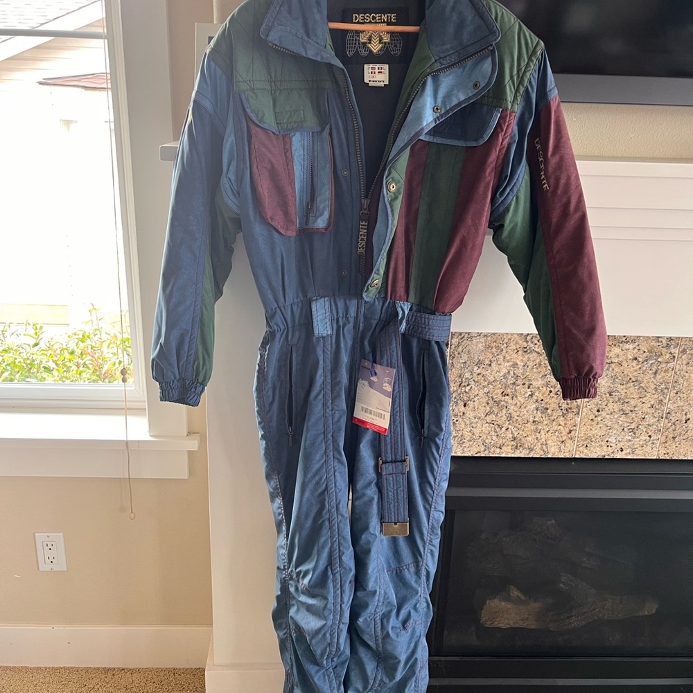Men’s Descente one piece ski suit, multicolor with Black and Gold accents